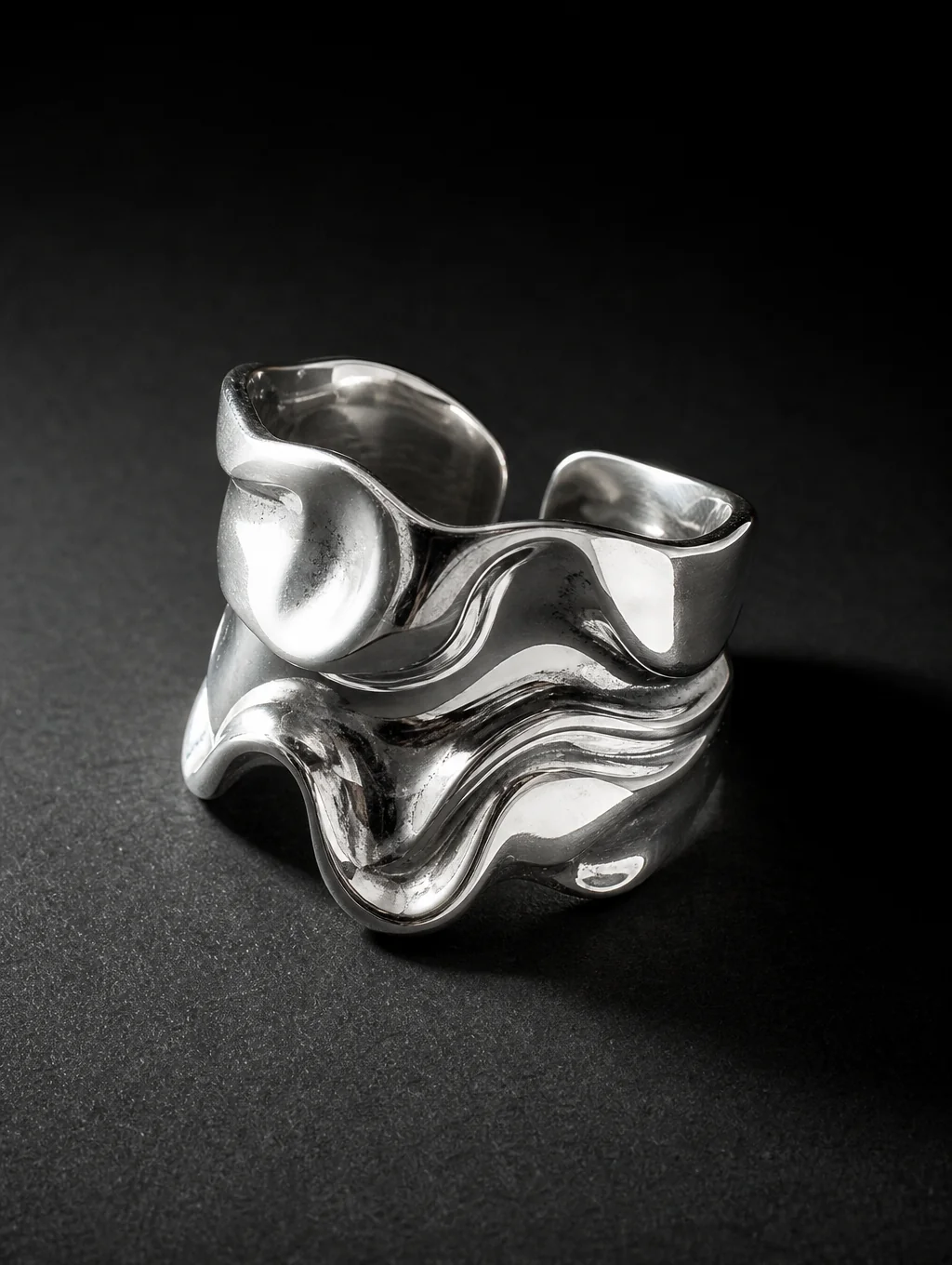 Macro shot of hand-forged sterling silver ring with hammered texture
